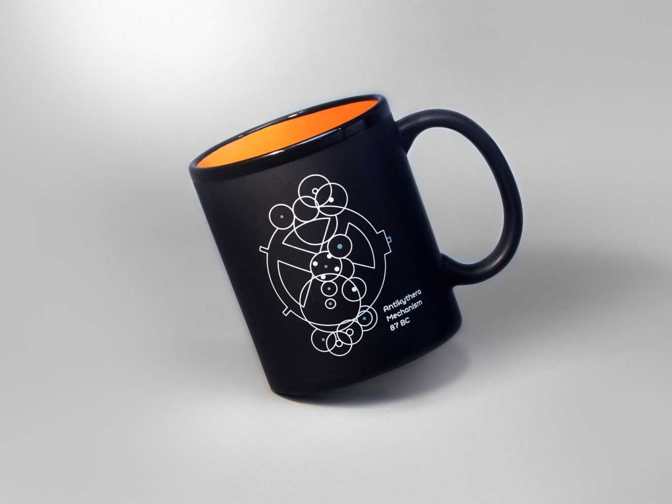 antikythyra logo design on a mug